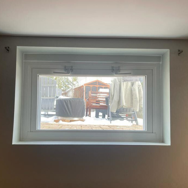 awning window in basement